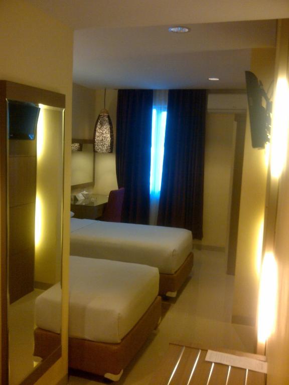 Amans Hotel Ambon Zimmer foto