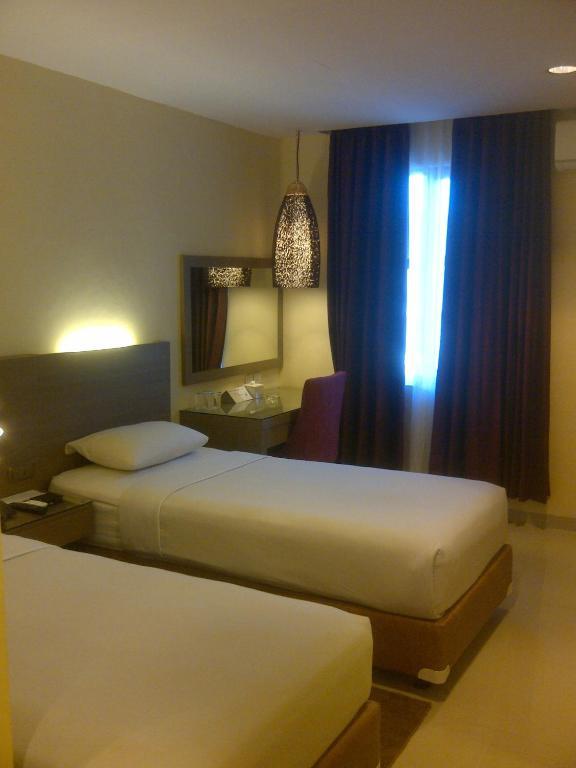 Amans Hotel Ambon Zimmer foto